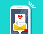 image of a cell phone with an email opening with a heart