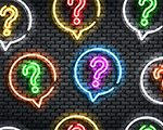 black background with neon question marks